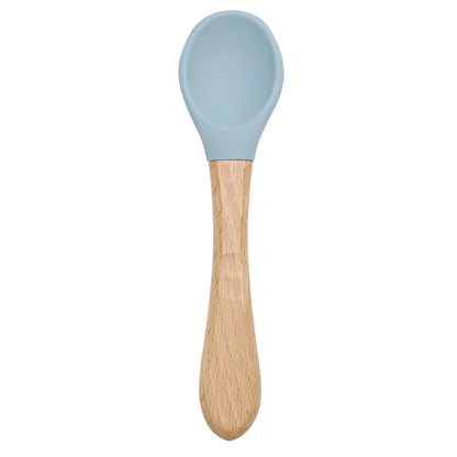 Cuillère en silicone avec manche en bois pour bébé