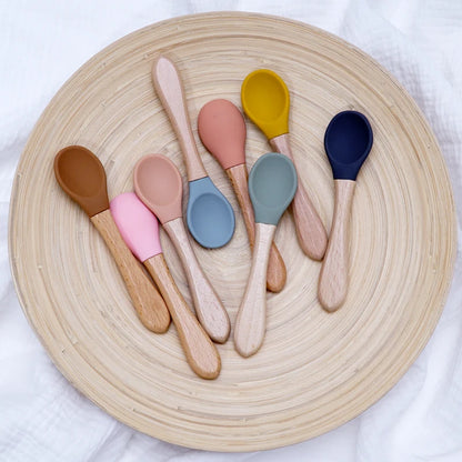 Cuillère en silicone avec manche en bois pour bébé